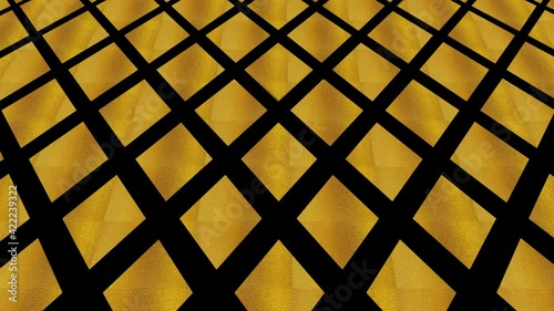 Art Deco gold pattern on a black background, which tilts up and moves down, composed of geometric shapes typical of the style, in 4K and 16:9 video format.