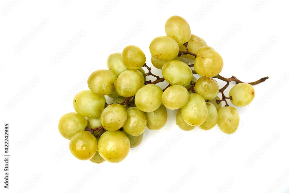 Yellow seedless grapes on white