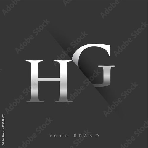 initial logo letter HG for company name, silver color and slash design in black background. vector logotype for business and company identity.