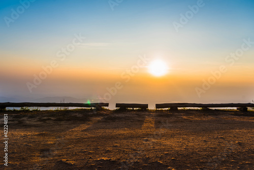 The timber seat with a view of the sunrise