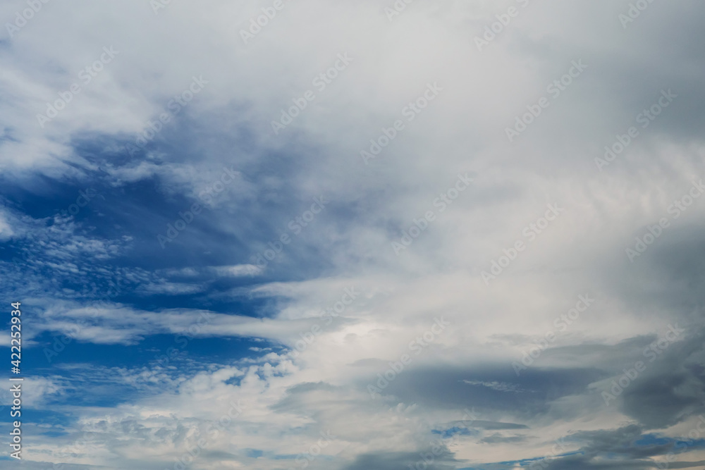 White clouds on a blue sky. Nature background.