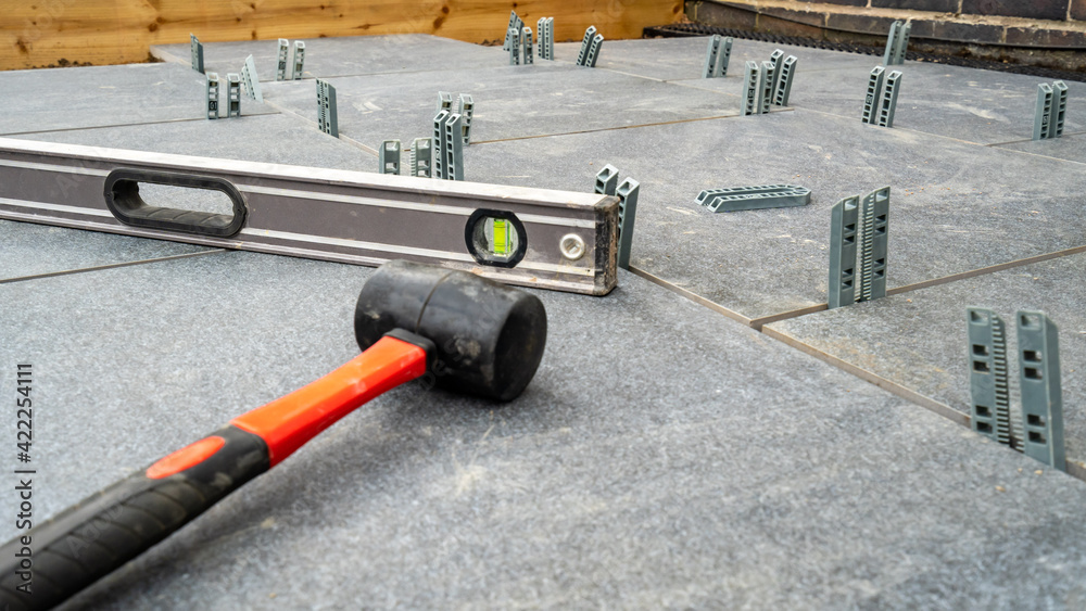 Rubber mallet and spirit level tools to build a patio Rubber mallet and spirit level tools to build a patio