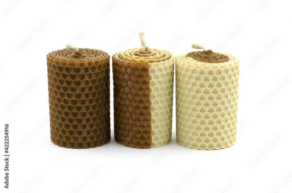 Scented wax candles isolated on white background. Honey-scented candles Scented wax candles isolated on white background. Honey-scented candles