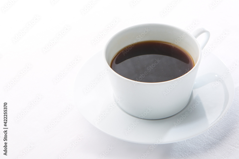 Cup of warm coffee on a simple background 심플한 배경에 따듯한 커피 한잔