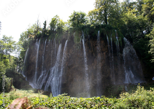Waterfall, Plitvice Lakes, Croatia, Europe. Ponds and falls in the green vegetation