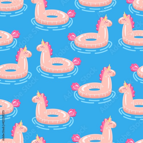 Iinflatable swimming ring seamless pattern. Pink unicorn in water. Cartoon vector illustration.