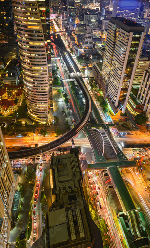 Aerial view of Bangkok city at night in Thailand. cityscape of Modern buildings  urban architecture and road traffic