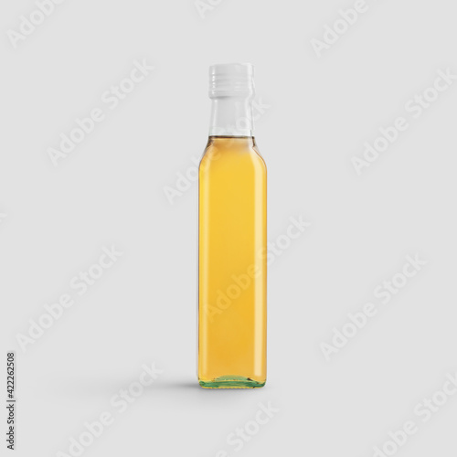 Mockup of a glass bottle with oil, with tamper evident