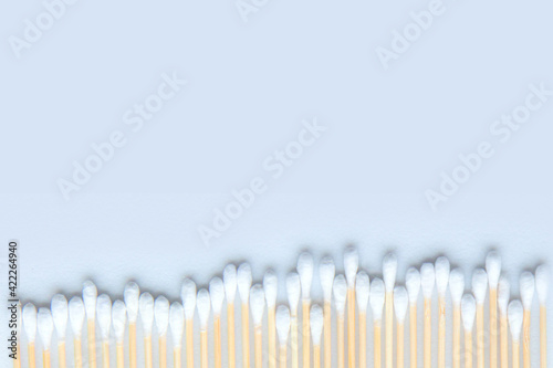 Set of bamboo cotton swabs on white background.