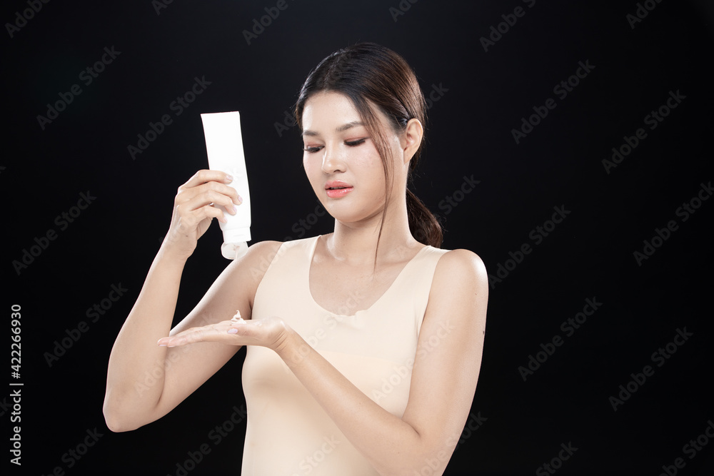 Woman apply Skincare lotion and moisturizer on Skin Woman apply Skincare lotion and moisturizer on Skin