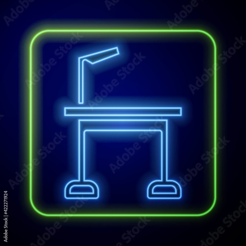 Glowing neon Pet grooming table icon isolated on blue background. Vector