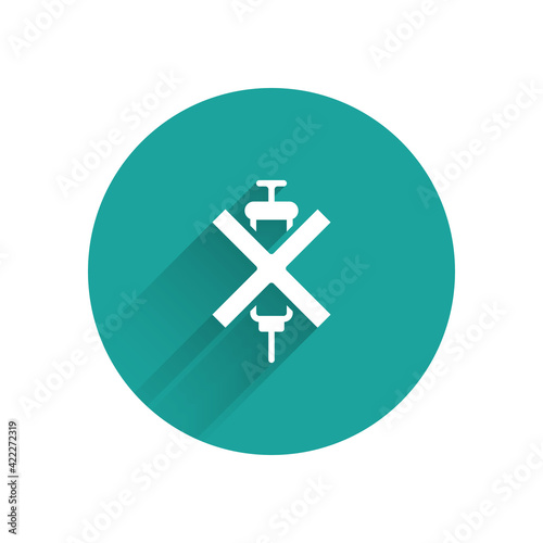 White No doping syringe icon isolated with long shadow. Green circle button. Vector
