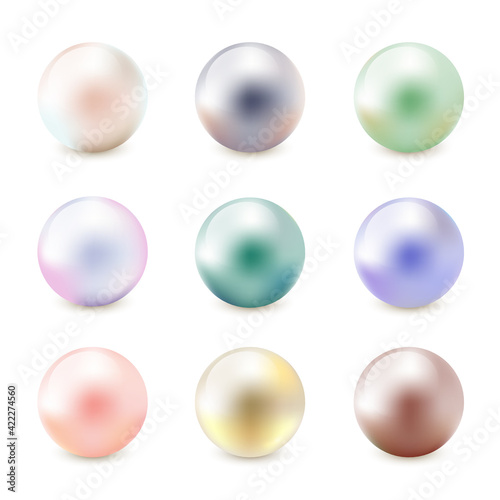 Vector balls collection. Realistic different color pearls set. 3d glossy balls with shadow isolated on white background. Pink, gold, silver, blue nacreous bead, precious gems. Vector image EPS10