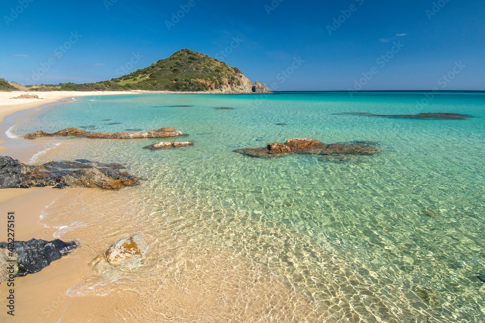 crystal clear water and white sand in Monte Turno beach, Costa rei, Sardinia