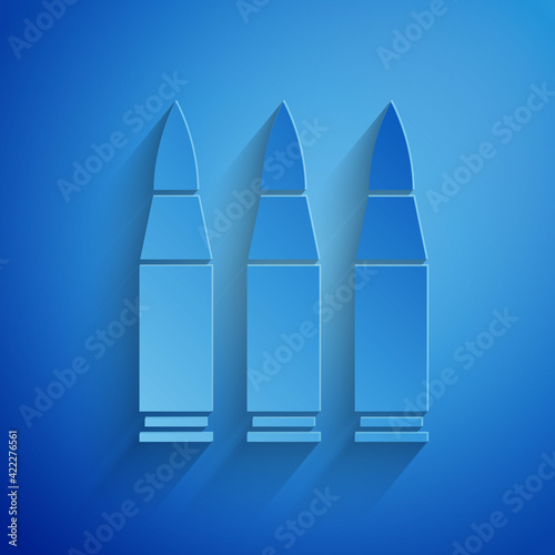 Paper cut Bullet icon isolated on blue background. Paper art style. Vector