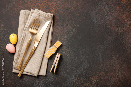 Easter setting table with cutlery and egg decoration