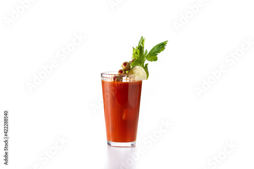 Bloody Mary cocktail in glass isolated on white background photo
