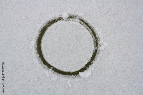 Circle symbol in the snow.