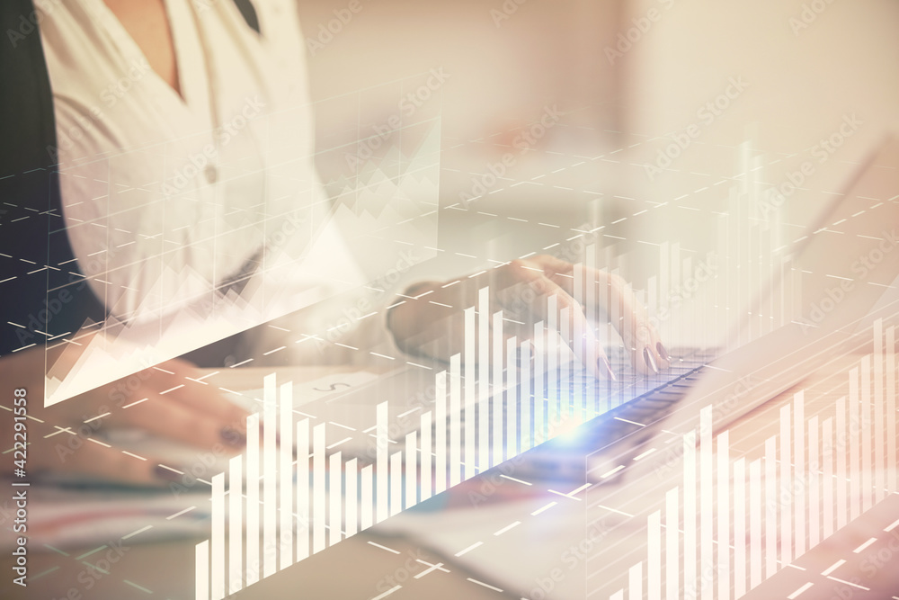 Double exposure of businesswoman hands typing on computer and forex graph hologram drawing. Financial analysis concept. Double exposure of businesswoman hands typing on computer and forex graph hologram drawing. Financial analysis concept.