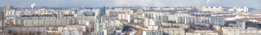 Ultra-wide panorama of the dormitory area of the metropolis of the metropolitan area, countless high multi-storey buildings.