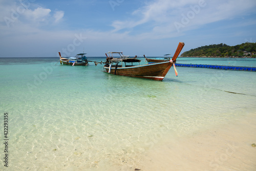 Scene of Pattaya beach and longtail boats at Lipe island