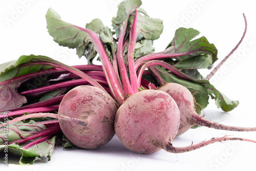 Beetroot Desi Chukandar With Green Leaves Is Consumed As Salad Or Juice. Rich Source Of Iron And Fibre Strengthens Liver And Helps Recover From Iron Deficiency. Isolated On White Background photo