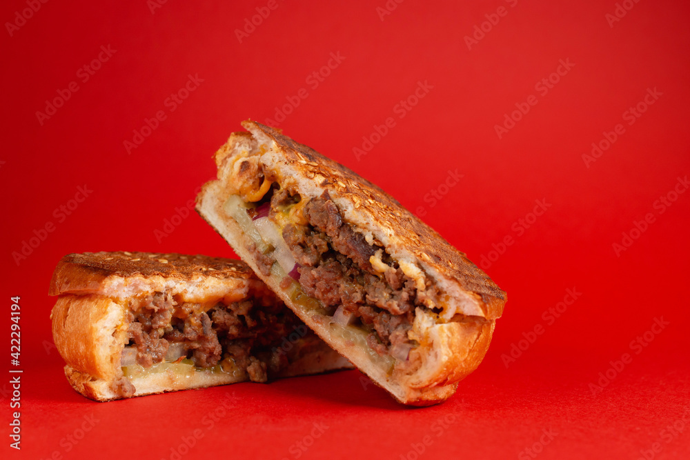 Grilled meat bun with red background. Horizontal banner Grilled meat bun with red background. Horizontal banner