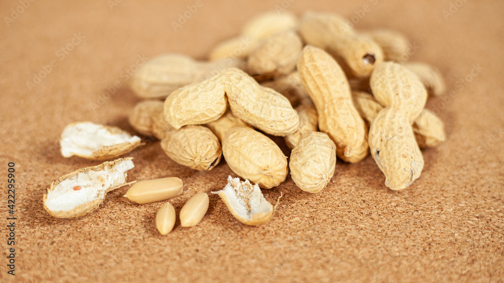peanuts on a cork tray