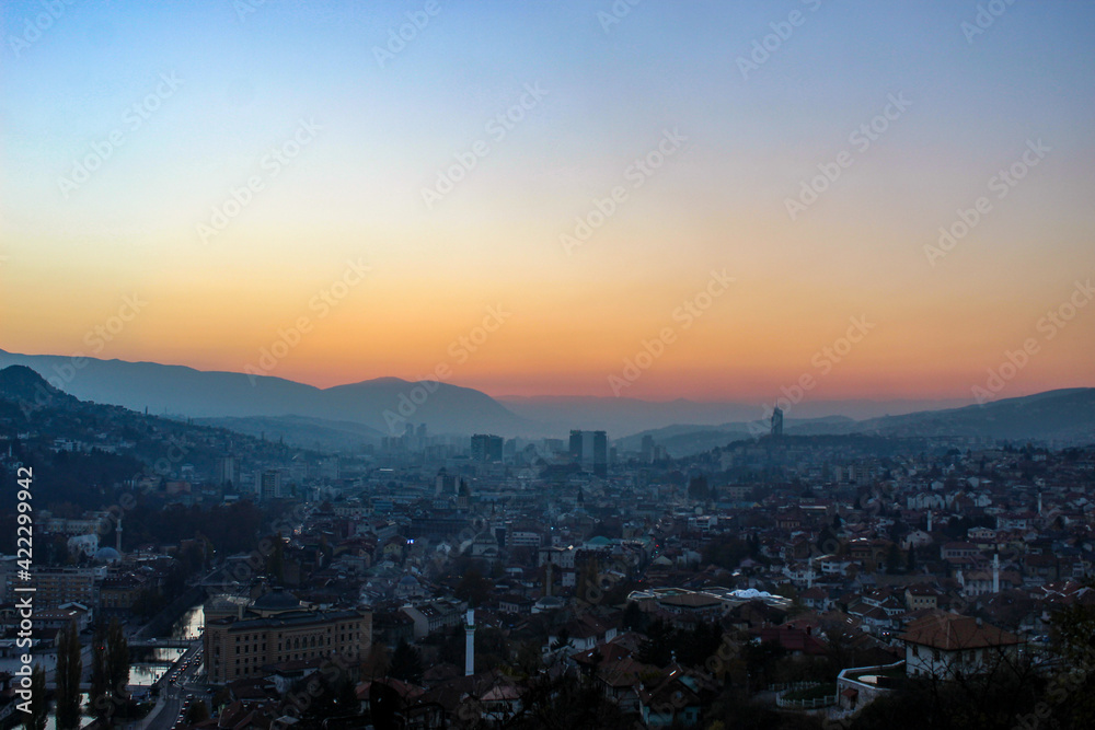 Colorful sky and sunset over Sarajevo. City of Sarajevo before night. Sarajevo, Bosnia and Herzegovina.