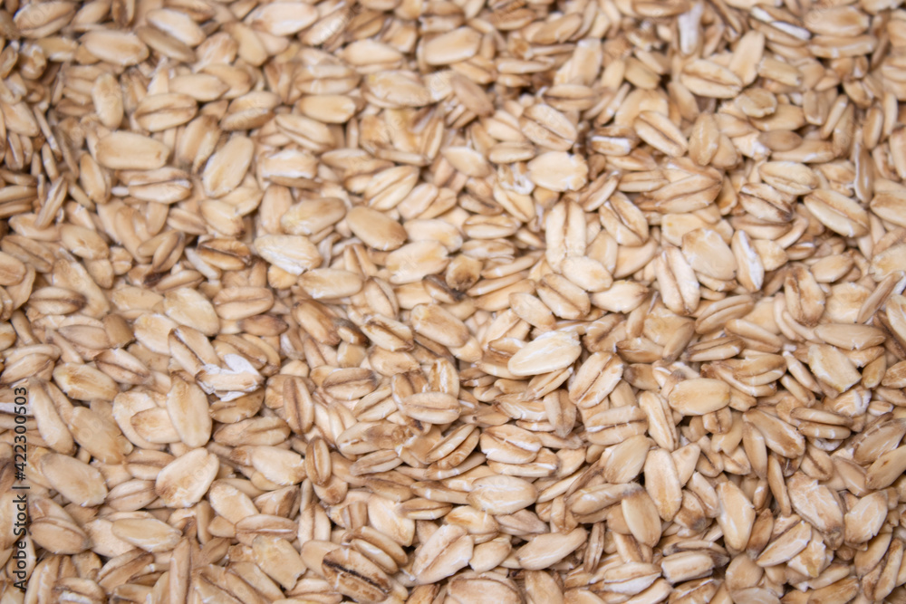Macro Oatmeal texture. oat flakes food background. Healthy breakfast concept. Muesli cereals. Macro Oatmeal texture. oat flakes food background. Healthy breakfast concept. Muesli cereals.