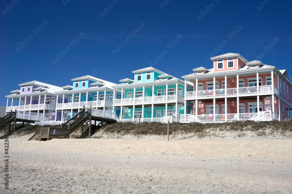 Row of multicolored beach houses 