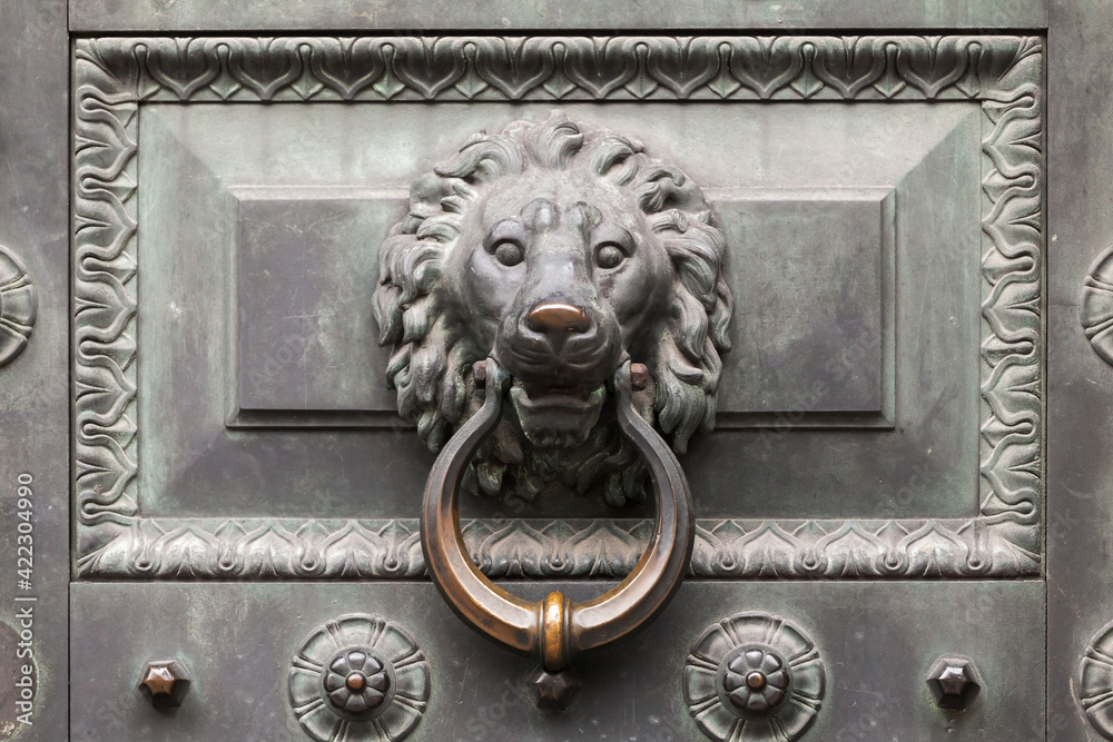 Old classic knocker in shape of lion head