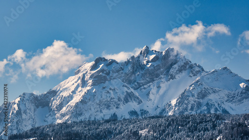 Snow covered Mount Pilatus against blue sky with few clouds © Maurice Lesca