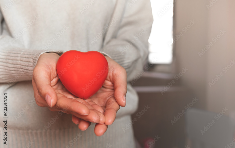 Red hearts with loving and caring adults. Symbol of support that expresses love valentine day and world heart day, heart health concept