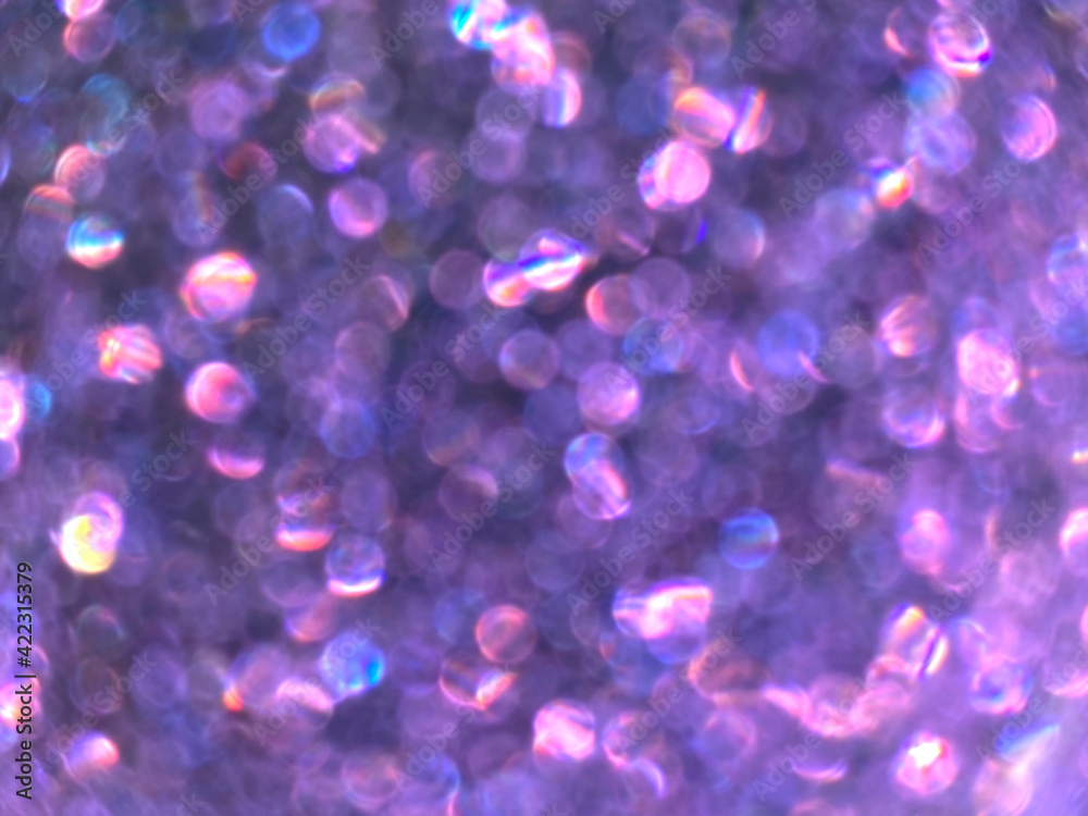 Abstract colorful purple and silver small bokeh Look bright effect texture on black background. glitter vintage lights defocused elegant for cosmetics or celebrate. Sparkling magical dust particles.