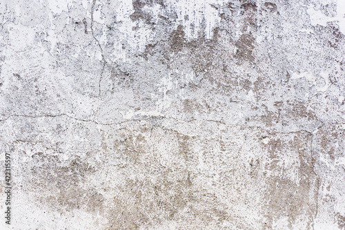 Gray concrete wall. Grunge industrial plaster. White peeling paint background. Cracked wall texture. Dirty damaged building. White overlay pattern. Noise backdrop.