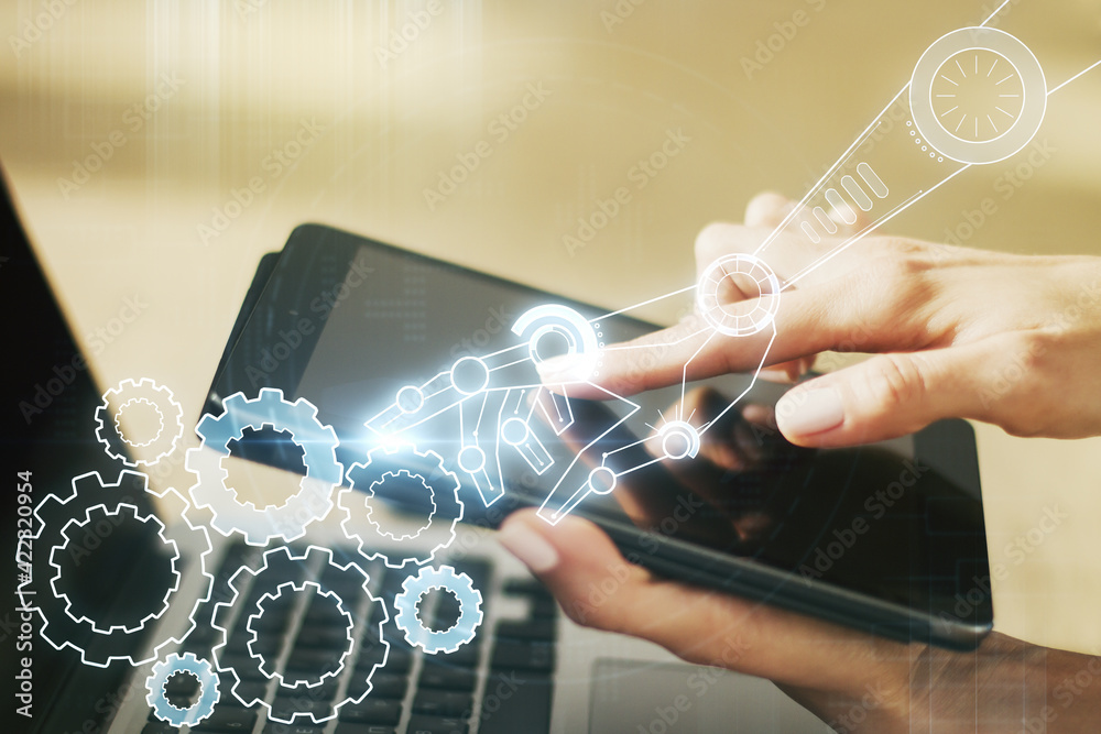 Creative concept of robotics technology and finger clicks on a digital tablet on background. Robot development and automation concept. Multiexposure Creative concept of robotics technology and finger clicks on a digital tablet on background. Robot development and automation concept. Multiexposure