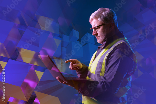 Man worker in a yellow vest...