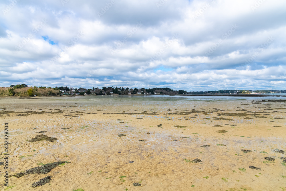 Brittany, Ile aux Moines island in the Morbihan gulf, the church and the Port-Miquel beach, beautiful light
