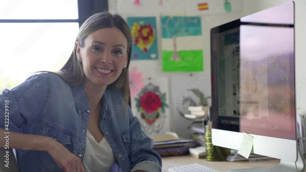 Woman working from home on desktop computer Woman working from home on desktop computer
