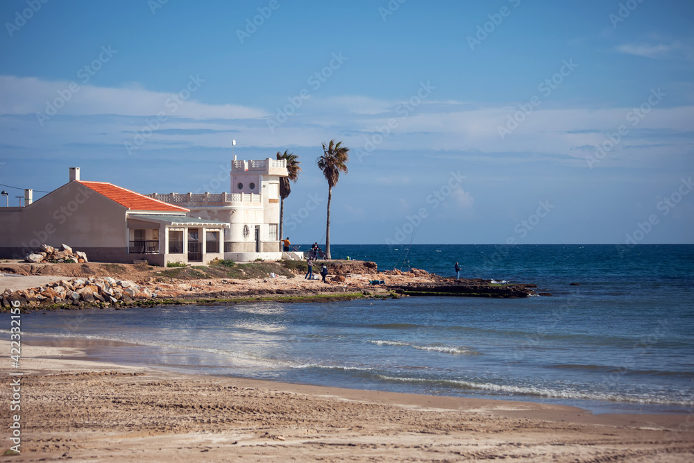 Beach at Mediterranean Sea, Torrevieja. Province of Alicante, Costa Blanca, Spain Beach at Mediterranean Sea, Torrevieja. Province of Alicante, Costa Blanca, Spain