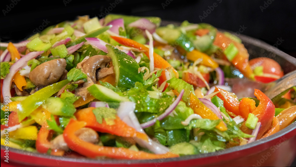 The regional cuisine of Israel in a hotel. Fresh vegetable salad. Buffet etiquette The regional cuisine of Israel in a hotel. Fresh vegetable salad. Buffet etiquette