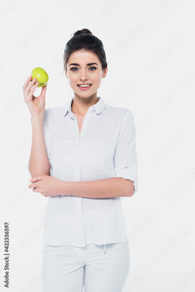 Smiling woman holding organic apple isolated on white Smiling woman holding organic apple isolated on white