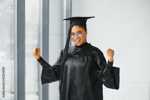 A pretty african american woman graduate