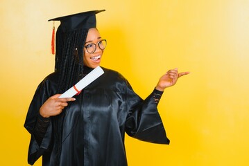 A pretty african american woman graduate