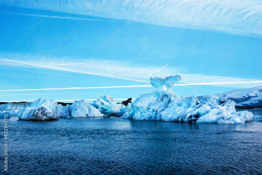 Magical beautiful landscape with ice depths in the famous Jokulsarlon glacial lagoon in Iceland. Exotic countries. Amazing places. Popular tourist atraction. (global warming – concept)
