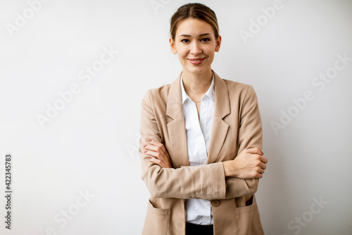 Young woman standing by the...