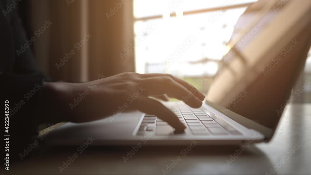 person typing on a laptop computer person typing on a laptop computer