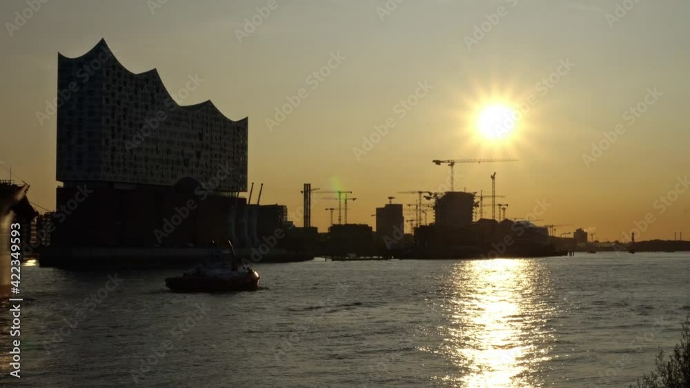 Sunrise at Elbe in Hamburg Hafencity - Harbour Container Ship Sunrise at Elbe in Hamburg Hafencity - Harbour Container Ship