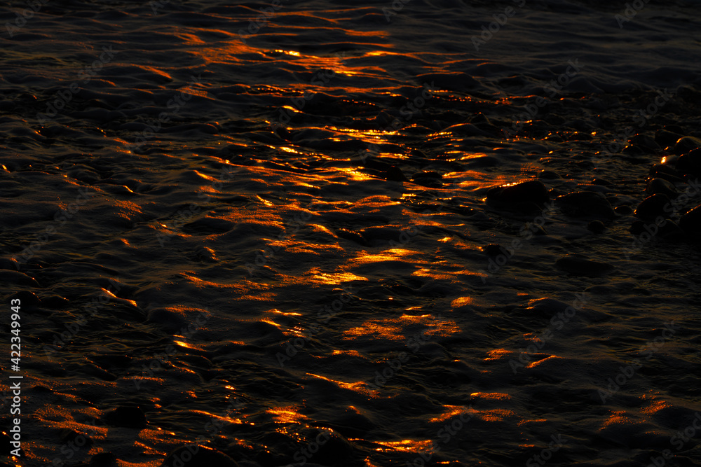 Beautiful yellow sunset reflected in the sea Beautiful yellow sunset reflected in the sea
